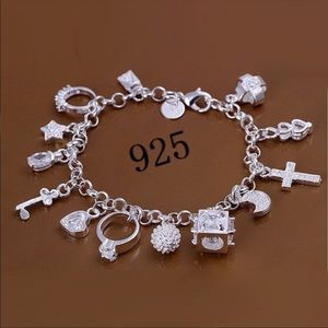 A Silver Tone Charm Bracelet